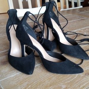 Black suede pumps
